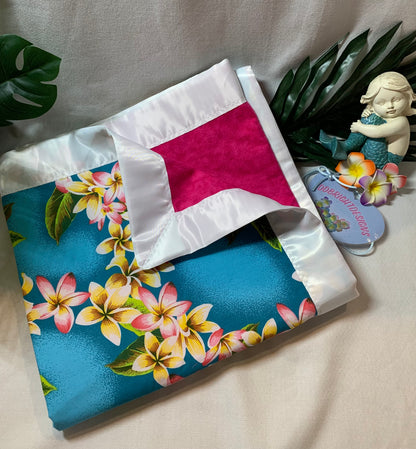 100% cotton cyan blue plumeria print with a satin trim