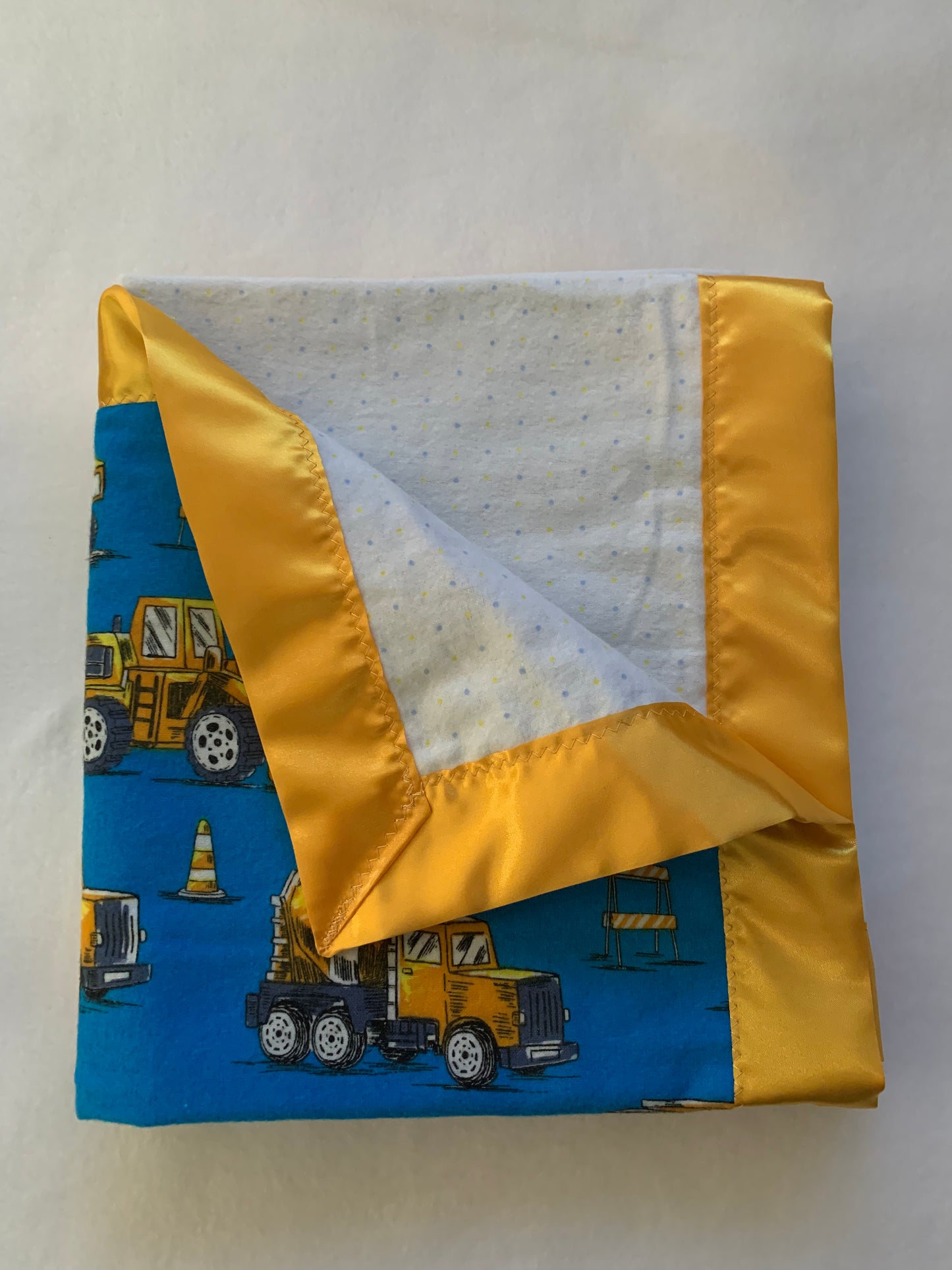 100% cotton construction vehicle print baby blanket with satin trim