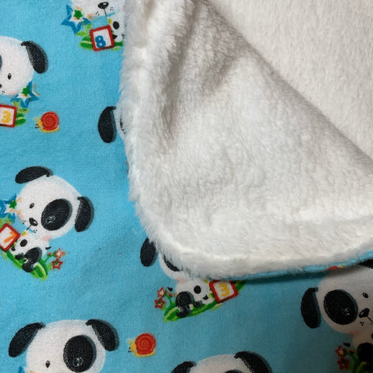 Plush fleece backed crib blanket